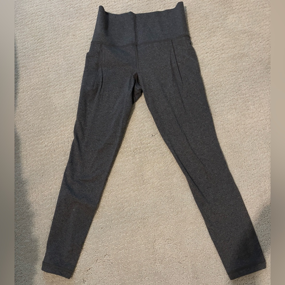 Athleta 7/8 Salutation stash pocket leggings